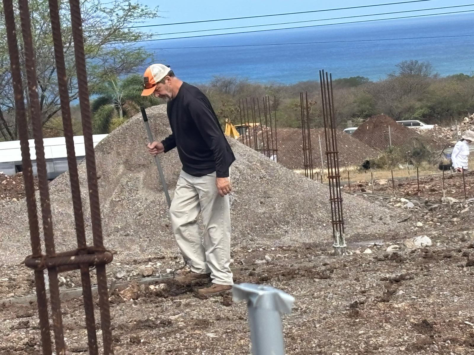 Moving gravel under the Caribbean sun