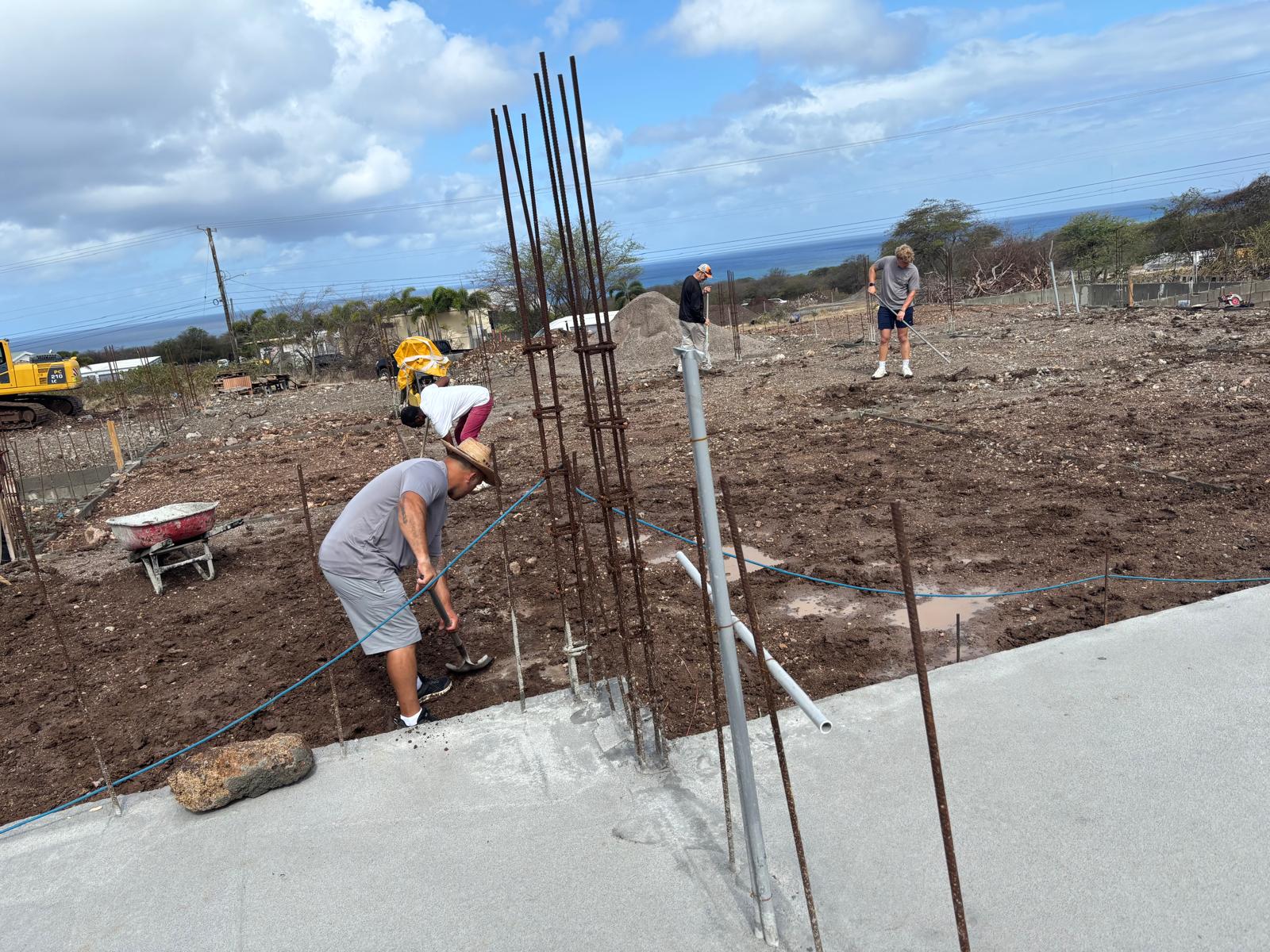 Setting rebar with the local crew